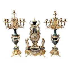  2 Brass clock and candlestick set