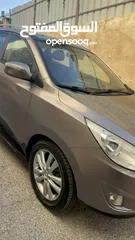  3 2009 ‏Hyundai توسان LX20 اربع ابواب، اللون فيراني، الكراسي جلد والسيارة 92,000 كيلو فقط وبحالة رائعة