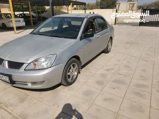  3 ميتسوبيشي لانسر 2006 مرخصه جديد للبيع 4300 قابل للتفاوض بعد المعاينه