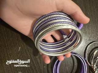  1 اساور بلاستيك بنفسجي، وفضي عدد 15