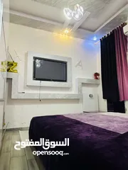  18 شقة كبيرة دور أول بشارع جمال عبدالناصر الزاوية / ع الرئيسي