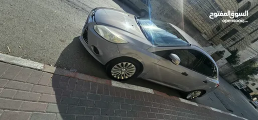  9 فورد فوكس 2012 ترخيص+ تأمين شامل