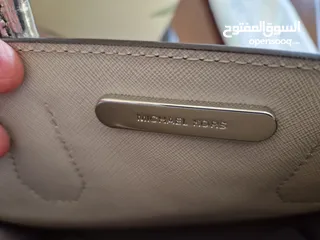  3 Like new Michael Kors crossbody bag metallic colour