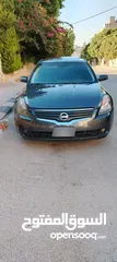  5 نيسان التيما هايبرد 2009 فل كامل مسكر اعلى صنف لون فيراني