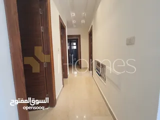  7 شقة ارضية مع ترس للبيع في رجم عميش بمساحة بناء 215م