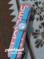  1 ساعة سواتش اروني سويسري اصلي 100بالمية شغالة 100بالمية اصدار سبور