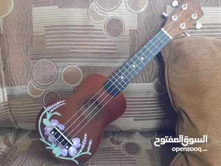  4 جيتار امريكي صغير خشب