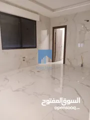  10 شقة أرضية فاخرة للبيع في الرابية  - خلف الإتصالات ( Orange ) 195م مع حديقة وترسات 150م لم تسكن