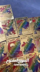  20 كروت بوكيمون والبومات (Pokemon cards and binders)
