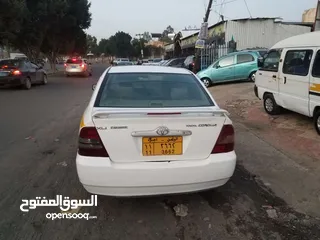  6 كرلا 2003 جير عادي فريمات ومرايا كهربا مكينه 13 دواخل رمادي السياره نضيف مكينه وسبيت ماشالله