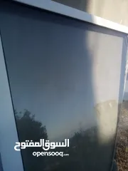  2 رفوف بلاستيكية، باب ألمنيوم، 2/ 4متر.