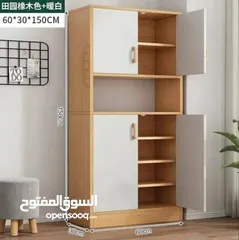  6 قدّمنا لك خزانة مطبخ خشب بـ 4 أبواب + رف وسطي بتصميم عملي وعصري الأبعاد: 150×30×60 سم