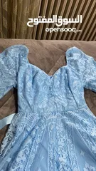  5 ‏فستان سهرة ‏قصير نوعا ما لونه ازرق سماوي ‏