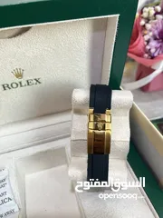  3 Black and golden Rolex