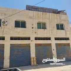  1 اربع مخازن على الشارع وتسوية وشقق عدد اثنين طابق اول