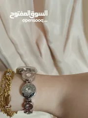  1 ساعة سواتش نسائية لون فضي نوديل راقي وناعم