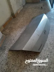  4 غطاء خلفي بدون فصالات وزرفيل، سيارة نيسان صني 2011