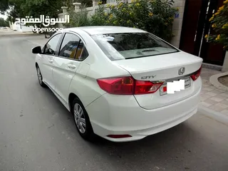  11 Honda City 1.5 L 2014 White Well Maintained Urgent Sale