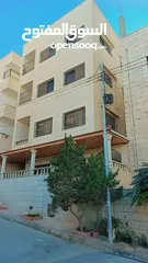  1 بناية مكونة من اربع طوابق /الزرقاء جبل طارق