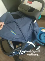  1 عربة أطفالstroller شبه جديدة