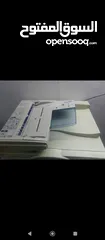  1 اله تصوير مع طابعه