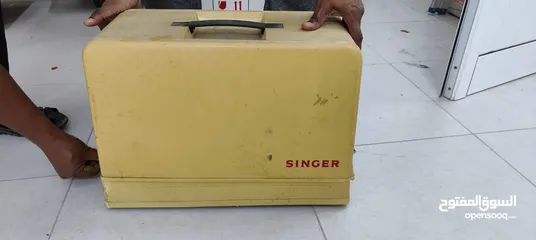  8 Singer sewing machine with pedals