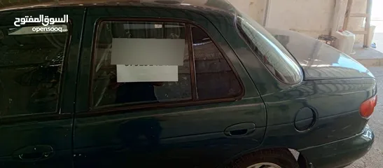  8 كيا سيفا 96 جير عادي خالي قص قلبان  للبيع مستعجل 1100 دينار