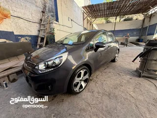  8 كيا ريو هاتشباك 2013