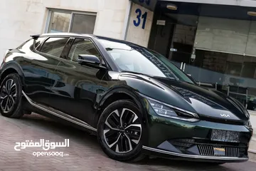  1 Kia EV6 2022 دفع رباعي بطاريه كبيره فل مسكر  فل اضافات خمس كميرات لون مميز