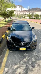  5 Well-maintained, Mazda CX-9, 7-seater, Oman-sold, dealer-serviced.