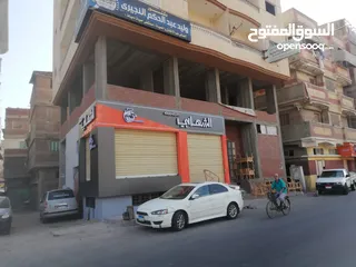  11 محل علي شارع رئيسي عرضه أكثر من 50 متر وعلي بعد 100 متر من ميدان الشهابية طريق عزبة اللحم