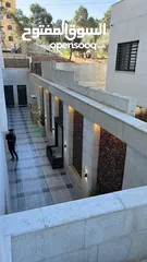  16 شقة طابق اخير مع روف 150م مع ترس 70م في اجمل مناطق ضاحية الامير علي