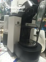  9 ماكينة نيسبريسو أصلية جديده بالكرتون وكتب التشغيل وماكينة طحن قهوه بحالة الجديده