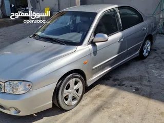  7 كيا سبيكترا 2001 بسعر 2400 جير عادي سياره نظيفه جدا  kia spectra 2001