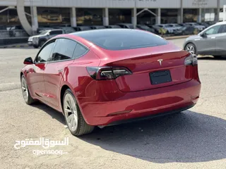  4 تسلا MODEl مج 3 موديل 2021 ستاندر بلس خمري داخل ابيض بحالة الوكاله فحص كامل حرره