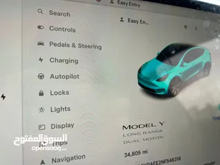  27 TESLA MODEL Y 2022 LONG-RANGE DUAL MOTOR-7 Seats  (سبع مقاعد)