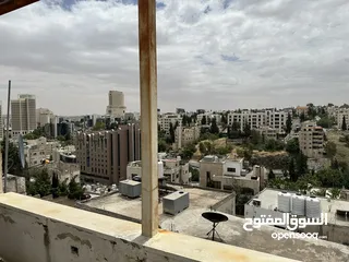  5 عمارة 8 شقق في العبدلي بجانب البوليفارد بدخل ممتاز للبيع بسعر الارض