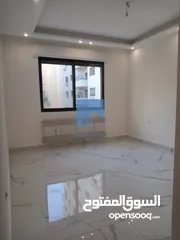  1 شقة أرضية فاخرة للبيع في الرابية  - خلف الإتصالات ( Orange ) 195م مع حديقة وترسات 150م لم تسكن