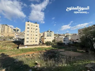  2 ارض للبيع في ام الشرايط بالقرب من الشارع الرئيسي