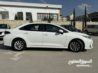  4 تويوتا كارولا ترخيص 2022 محرك 1800 هايبرد جير أوتوماتيك 170 حصان