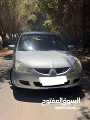  3 متسوبيشي لانسر 2005 محرك 1600