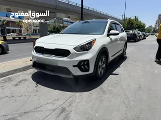  1 كيا نيرو هايبرد 2020 لون ابيض لؤلؤي فحص 4 جيد نظيفة جداً ممشى قليل