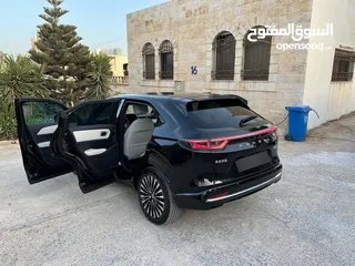  3 Honda E:NS1 E4 electric 2023  هوندا e:ns1 فئة E4 فل اضافات، اسود ميتاليك، داخليه لون ابيض فخمة