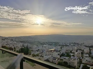  10 شقة فاخرة بإطلالة  مميزة بارقى مناطق عمان الغربية الجبيهة ارضي واخير مع رووف وطوابق