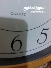  2 ساعة حائط وروبي اصلي
