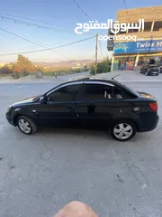  10 كيا برايد فتحة سقف بنزين 1600اوتماتيك