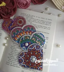  1 مراية كف وفواصل كتب بالخرز