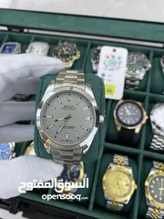  23 رولكس رجالي مرفق علبه وكيس رولكس وكفاله سنه