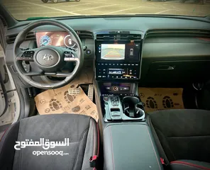  12 هونداي توسان  N-LINE  فل بدون فتحة  2x4 ///240Hp بنزين + كهرباء  2022 ( Haybrid) 1600cc