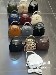  14 شنتة ستاتي اصلي مع العلبة  جلد طبيعي جودة عالية جدا  سحاب ويد طويلة  مقاس 21×27